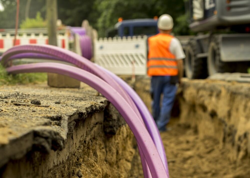 Technician performing fibre installation and repairs in Bellville and Brackenfell